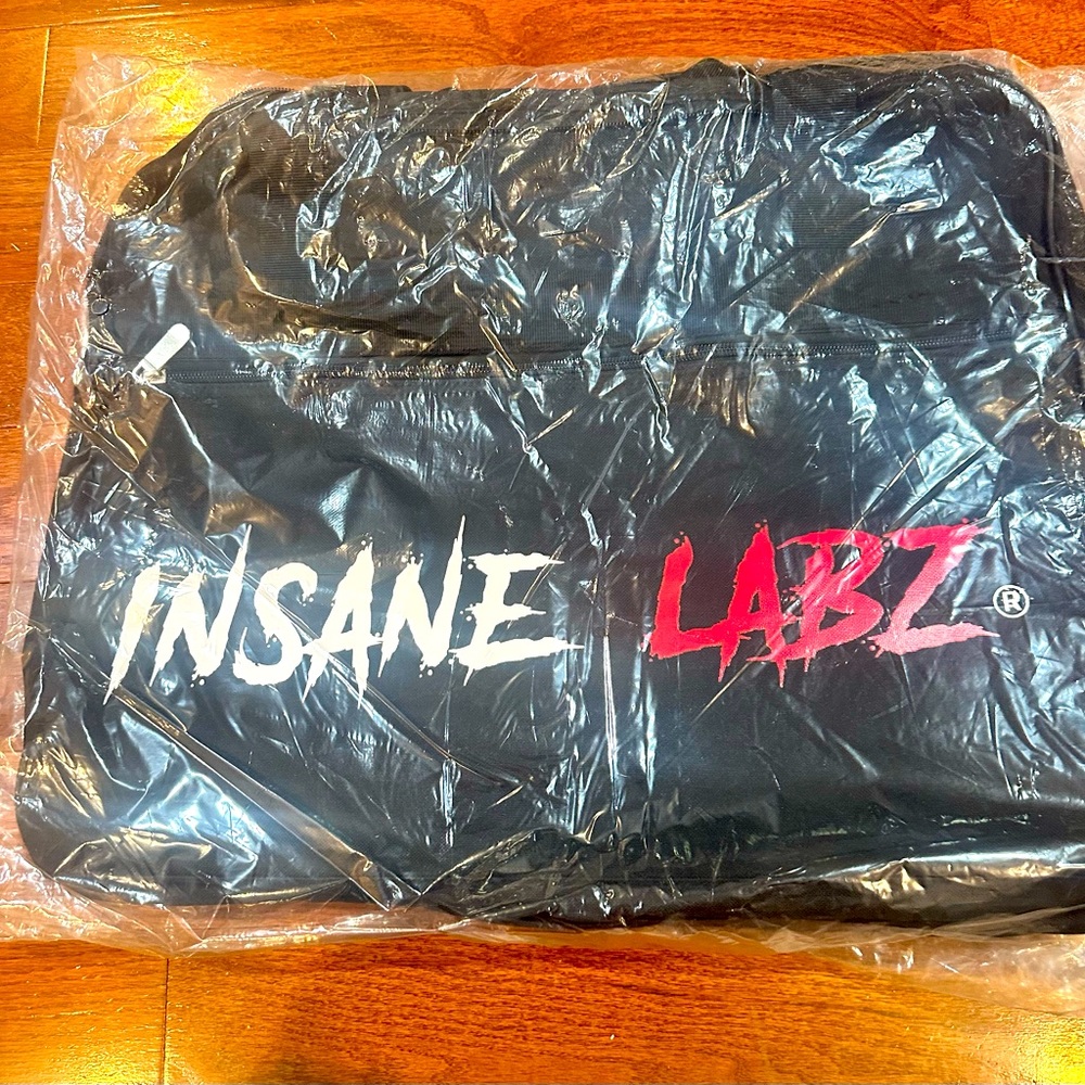 Brand new, still in package, unopened Insane Labz duffel bag.